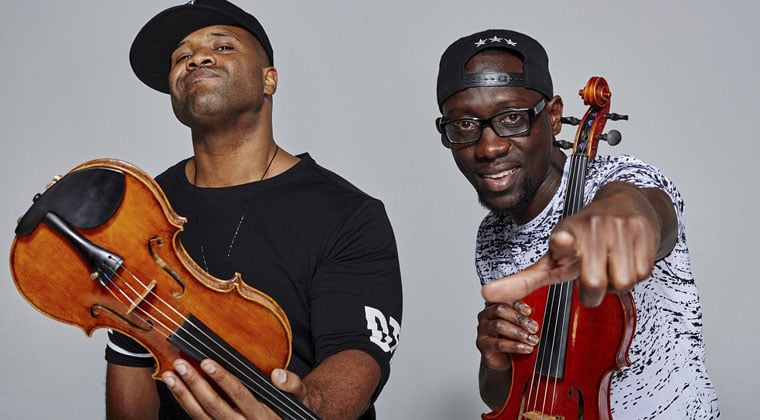 Artist Spotlight Black Violin Black magic woman halloween 2019 on an accordion, violin, autoharp melodica. artist spotlight black violin